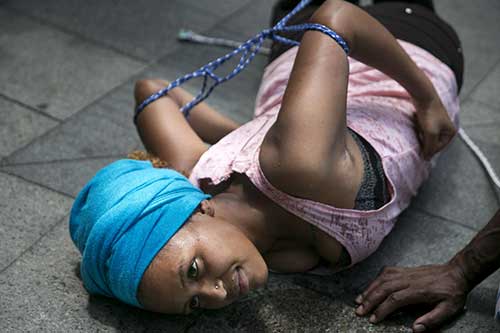 Woman tied up on the floor