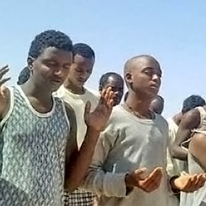 Young men praying